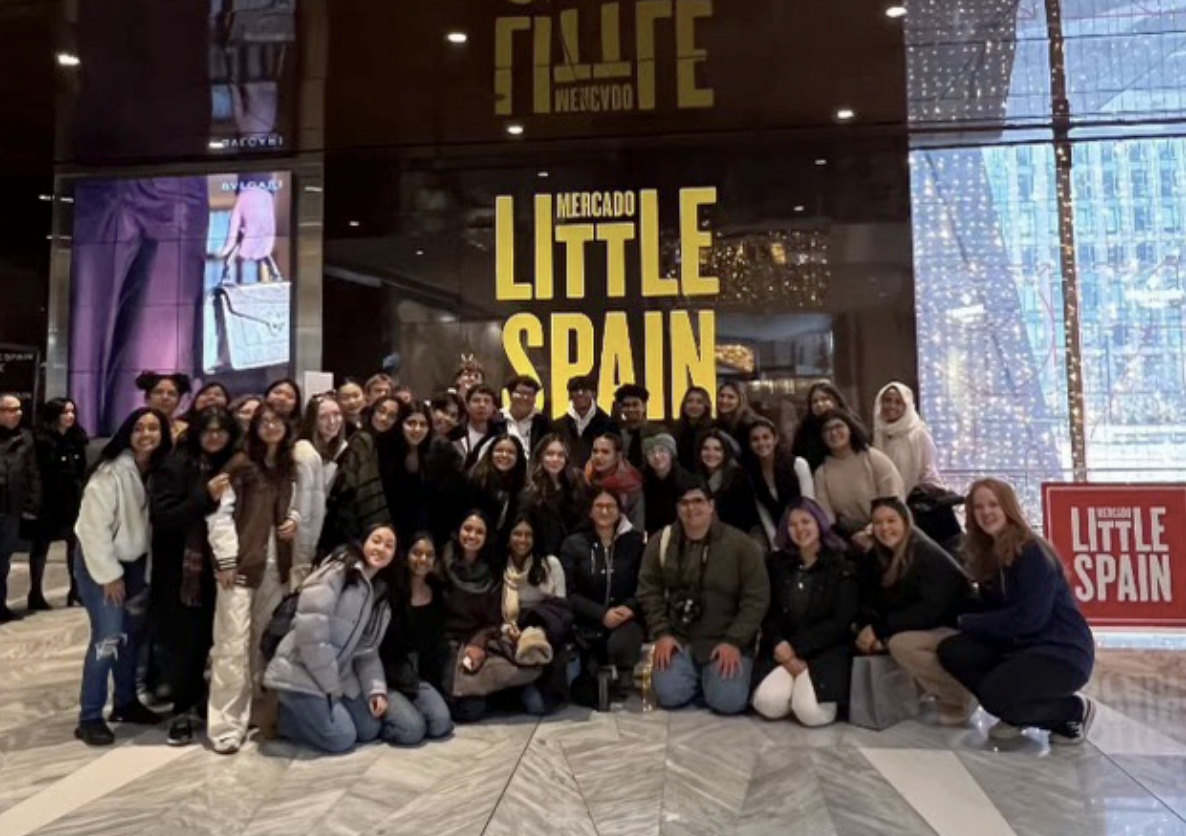 Students enjoy the ethnic delicacies found in Mercado Little Spain.

